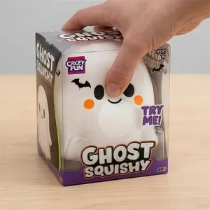 Crazy Fun Ghost Squishy toy in purple window box packaging being pressed by hand