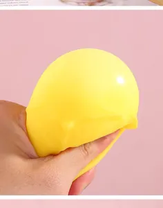 Yellow cheese-shaped stress relief toy showing its soft squeeze and high rebound texture