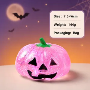 Pink glitter pumpkin Jack-o'-lantern squeeze toy for Halloween holiday stress relief
