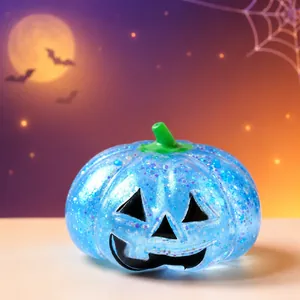 Translucent blue glitter Halloween pumpkin stress relief squeeze toy, size 7.5x6cm