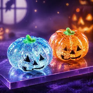 Halloween glittery pumpkin squishy toys for stress relief in blue and orange colors