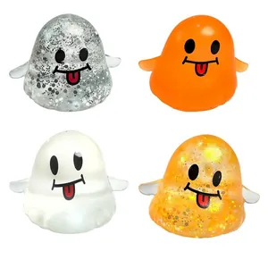 Lot de quatre adorables jouets anti-stress fantômes d'Halloween en orange et blanc.