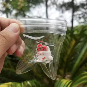 Christmas themed ice cube squishy toy inside a clear plastic bag for stress relief gifts.