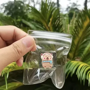 Detail shot of a Christmas-themed squishy toy in a mini clear cube