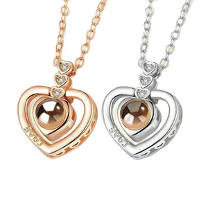 Elegant heart projection necklaces in rose gold and silver finish with engraved LOVE text