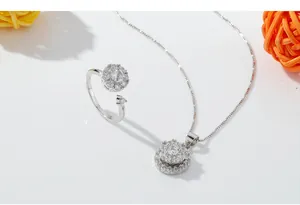 Exquisite silver-tone rotating sunflower pendant necklace and adjustable open ring jewelry set