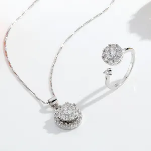 Elegant rotating flower necklace and ring set with sparkling clear crystals