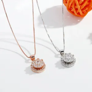 Elegant rotating double-layer pendant necklace set in rose gold and silver finishes