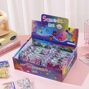 Colorful display box of sparkly sequin butterfly squeeze toys made of TPR material