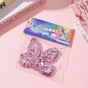 Sparkly pink glitter butterfly squishy stress relief toy made of TPR in cute packaging