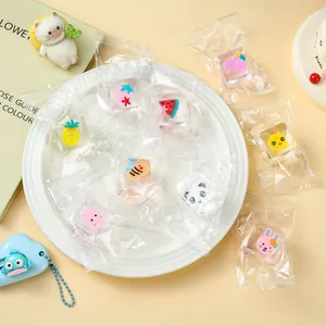 Detailed view of colorful cartoon animal and fruit ice cube squeeze toys in clear bags
