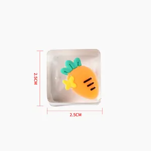 Detailed macro view of a cute cartoon carrot inside a 2.5cm clear squishy ice cube toy