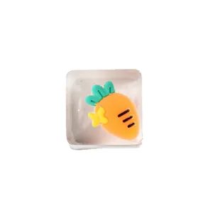 Cute cartoon carrot ice cube squishy toy for stress relief on white background