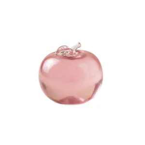 Delicate translucent pink apple squishy stress relief toy for relaxation and desk decor