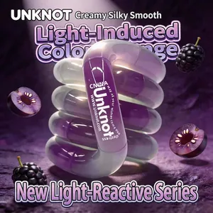 Close-up detail of Unknot Swirlz photochromic fidget toy showing smooth purple color change