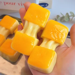 Detailed macro view showing the soft texture of a yellow food-shaped decompression squishy toy