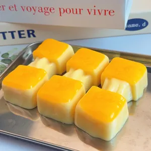 Close-up of yellow simulation food squishy toys shaped like cheese rice cakes