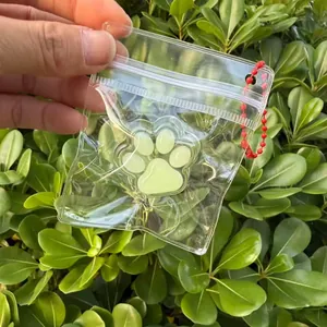 Μίνι χαριτωμένο παιχνίδι squishy πατούσα γάτας σε διαφανή τσάντα με κόκκινη αλυσίδα μπρελόκ