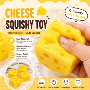 Detail view of a hand squeezing a soft yellow cheese-shaped slow rebound squishy toy