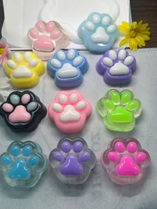 Detailed macro view showing a variety of colorful soft cat paw squishy squeeze toys