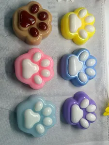 Detailed macro view of colorful cat paw squishy stress relief toys with soft slow rebound