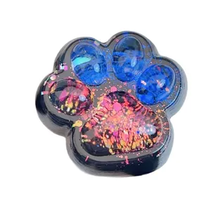 Detail shot of a starry sky dual-color cat paw squishy toy with glitter texture