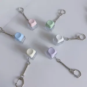 Set of six colorful mechanical keyboard switch tester keychains in pastel tones.