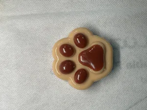 Close-up detail of a soft cat paw squishy toy for stress relief and relaxation