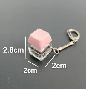 Detailansicht des rosa mechanischen Tastenkappen-Fidget-Schlüsselanhängers mit Maßangaben