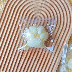 Close-up of cat paw squishy toy with realistic fried texture in clear packaging