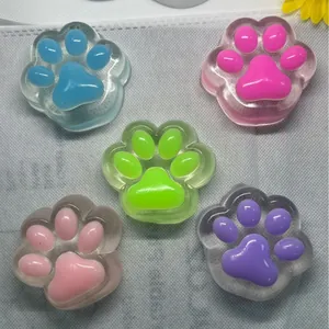 Set of five colorful cat paw squishy toys for stress relief and sensory fidget play