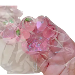 Cute strawberry cat paw squishy toy for stress relief with slow rebound effect