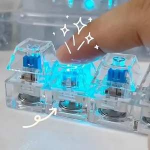 Detail view of 4-key transparent mechanical keyboard fidget toy with blue LED light