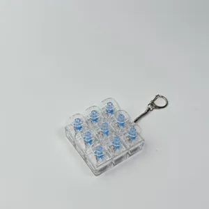 Detailed macro view of a 9-key clear mechanical switch tester keychain fidget toy