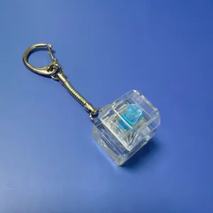 Διαφανές μπρελόκ με μηχανικό διακόπτη μπλε στέλεχος παιχνίδι κατά του στρες για το γραφείο