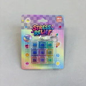 Retail blister pack showing 9 colorful mechanical keyboard switch fidget toy keychains.