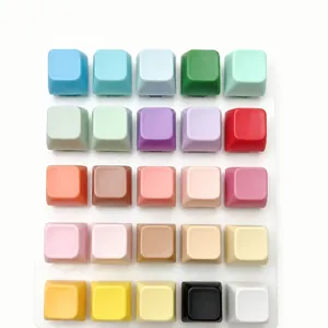 Colorful square keycap fidget toys arranged in a grid pattern for stress relief