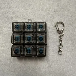 Creative 9-key mechanical switch fidget keychain stress relief toy with blue switches