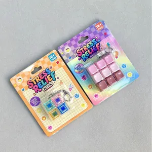 Two colorful stress relief button fidget toys with keychains in blister card packs