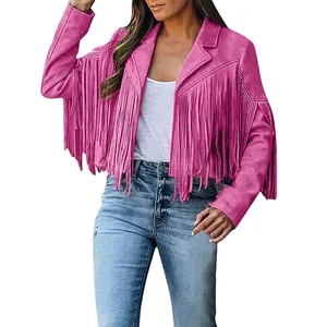 Close-up detail of women's short faux suede jacket with fringe in vibrant pink color.