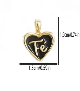 Detailed view of gold-plated heart pendant with black enamel and 'Fé' script and measurements