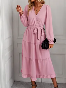 Elegant mauve V-neck tiered long dress featuring long sleeves and a matching waist tie belt.