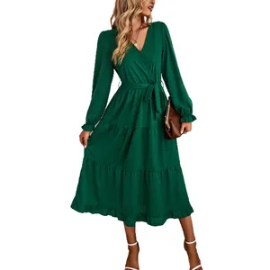 Elegant solid green V-neck long-sleeve maxi dress with tiered ruffle hem and belt
