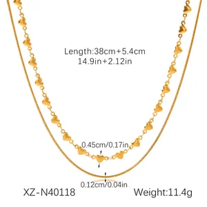 Detailed close-up of gold-plated double layer necklace with heart chain and measurements