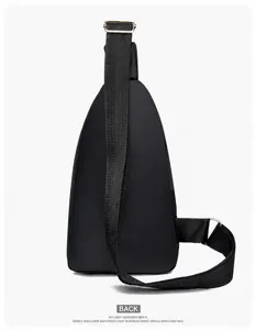 Detailed back view of the black nylon chest bag showing the adjustable shoulder strap.
