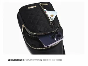 Detail view showing the storage capacity of the front zipper pocket on the nylon chest bag.