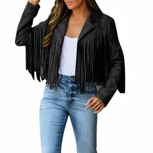 Detailed view of women's black suede fringe jacket with classic tassel design elements.
