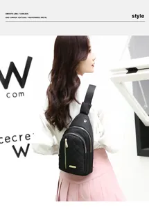 Back view of a stylish woman wearing a black quilted nylon chest bag with gold zippers