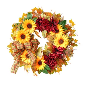 Autumn sunflower wreath with red dahlias and plaid bow for harvest door decoration