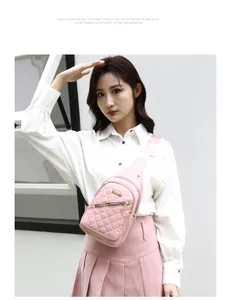 Close-up of stylish pink quilted nylon chest bag worn by a female model.